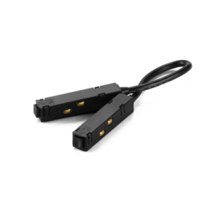 Jonction coude pour rail magnétique